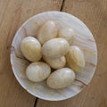 Carved Stone Eggs in Onyx Bowl