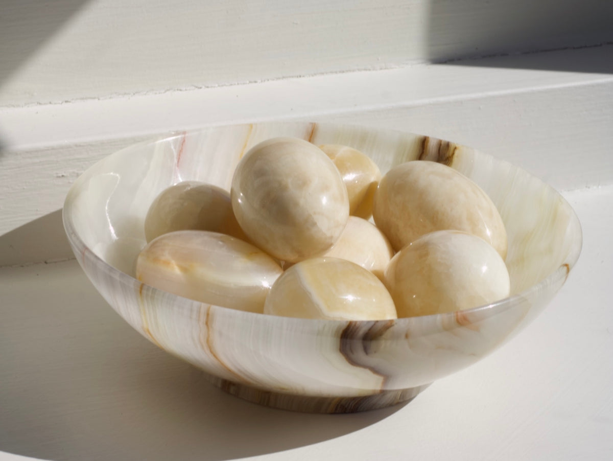 Carved Stone Eggs in Onyx Bowl