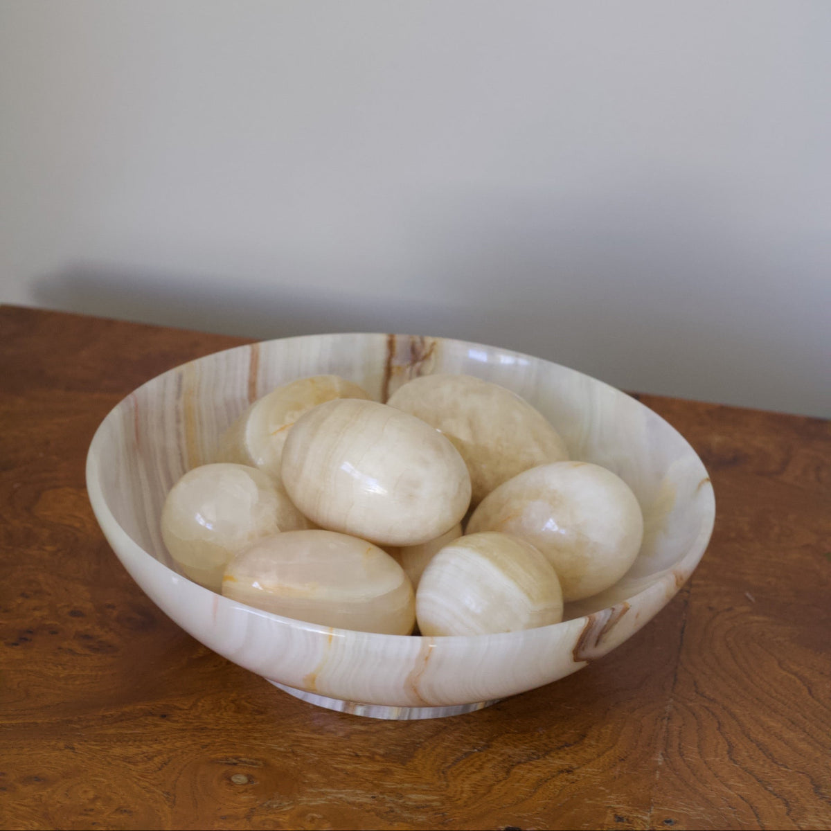 Carved Stone Eggs in Onyx Bowl